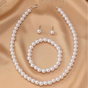 Three-piece set of 8mm white pearl jewelry including necklace, bracelet and stud earrings