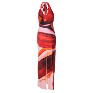Detail view of backless halter maxi dress with red and orange abstract marble print