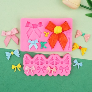 Detailansicht der rosa Silikon-Schleifenformen mit feinen Texturen für Fondant und Ton DIY