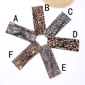 Set of six leopard print elastic headbands with stylish cross knot for sports yoga