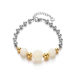 Detail of stainless steel beaded bracelet with mixed gold, silver, and pearl-textured beads