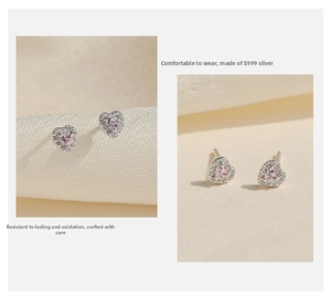 Detail of S999 silver heart stud earrings with pink zircon and micro-pave white stones