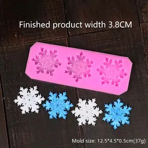 Macro detail of snowflake silicone mold with dimensions for DIY chocolate and crafts