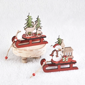 DIY wooden Christmas sleigh ornaments with reindeer and snowman on plush background