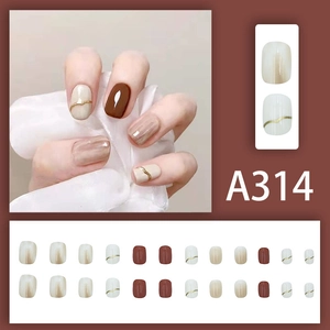Elegant 24pcs press-on nails with cream, brown gradient, and gold wave accents