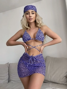 Detailed view of three-piece blue wave bikini with matching mesh skirt and headscarf