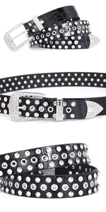 Detail of black crocodile texture belt with silver rhinestones and metal eyelets