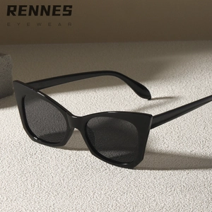 Occhiali da sole cat-eye neri classici con lenti grigio scuro e design vintage