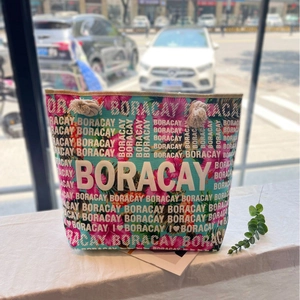 Floral canvas beach shoulder bag with rope handles and Boracay print in blue and pink