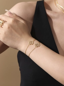 Elegant gold necklace and double-layer bracelet set with sparkling zircon clover charms