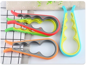 Macro detail of ergonomic 4-in-1 jar opener showing various sizes and anti-slip rubber lining