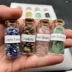 Set of 4 mini glass bottles with corks filled with Rose Quartz and Lapis Lazuli stones