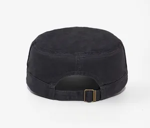 Detail view of adjustable brass buckle and canvas texture on back of black military flat top cap