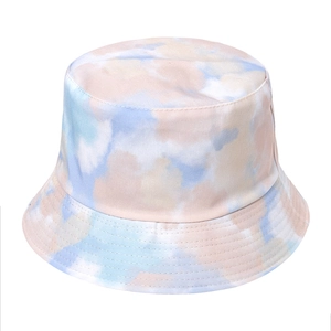 Detail of macaron tie-dye bucket hat showing fine stitching and soft canvas texture