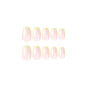 Minimalist green French press-on nails set with translucent nude and light yellow tips