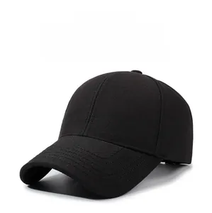 Detailed view of black cotton baseball cap with side square metal logo and curved brim
