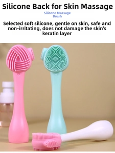 Detailed view of dual-sided silicone facial brush showing massaging and cleansing bristles