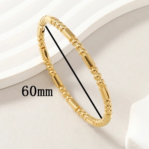 Elegant gold beaded stainless steel bracelet with 60mm inner diameter on white display
