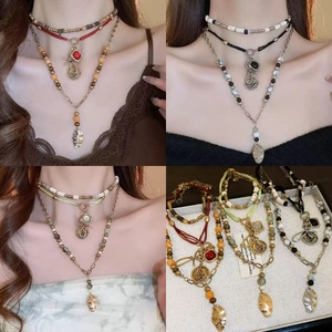 Vintage multi-layer beaded necklace set with wood beads and rustic metal coin pendants