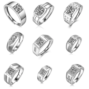 Various luxury 925 sterling silver men's rings with large Moissanite stones on white background