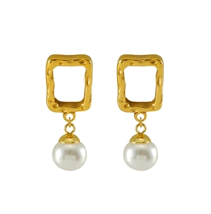 Detail of French vintage gold hammered rectangular earrings with white pearl pendants