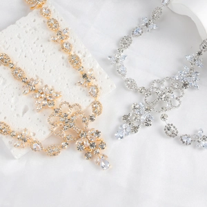 Bohemian crystal forehead hair chain in gold and silver with intricate leaf designs