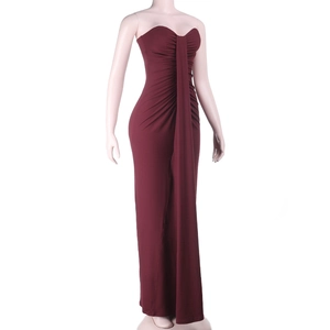 Detailed view of wine red strapless dress with elegant ruching and gathered drapes