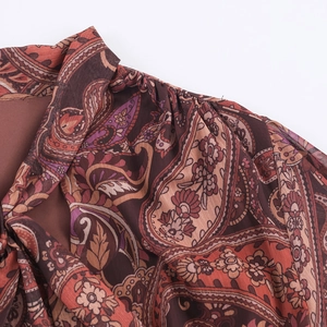 Bohemian paisley chiffon dress with vintage tie neck and irregular hem detail