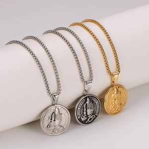 Vintage stainless steel praying hands medallion necklaces in silver, aged silver and gold