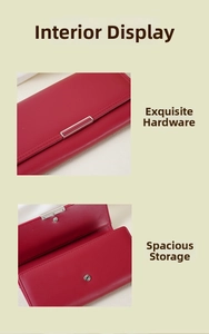 Macro shot of red leather wallet interior with multiple slots and metal buckle detail
