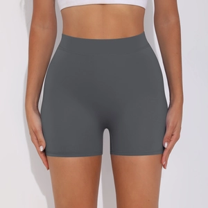 Close-up of wide waistband on dark grey high-waisted yoga shorts with elastic fabric