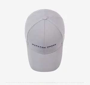 Flat lay macro view of the light grey baseball cap featuring NARASON SPORT embroidery