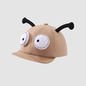 Detail of soft cotton baby hat featuring cute 3D cartoon tentacles and large funny eyes