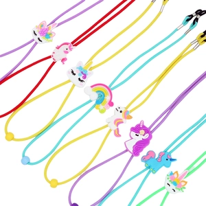 Detail of colorful children's anti-slip eyeglass cords with unicorn and rainbow charms