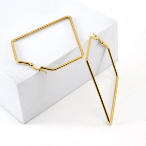 Minimalist gold stainless steel geometric rhombus hoop earrings on white display