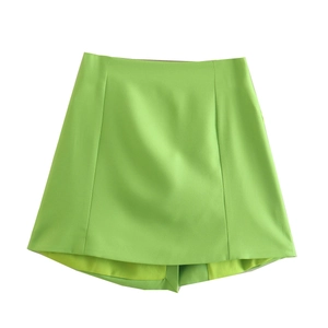Women's apple green A-line mini skirt in premium woven fabric on white background