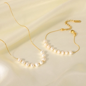 Parure collier et bracelet en acier inoxydable doré 18K avec perles d'eau douce