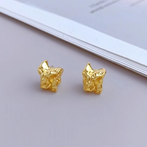 Minimalist gold irregular lava stud earrings with crumpled metal texture for women
