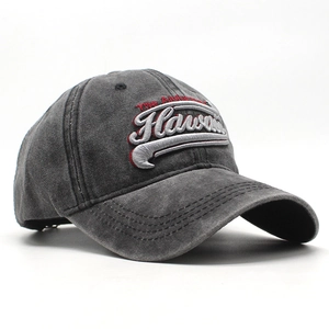 Detail of vintage washed charcoal baseball cap featuring Hawaii 3D embroidery and red text