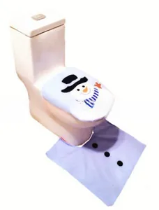 Detail of blue snowman toilet cover and rug set with soft plush texture for Christmas