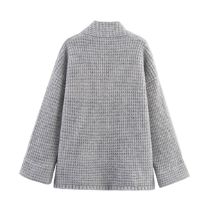Back view of grey waffle knit double-breasted V-neck cashmere cardigan with drop shoulders
