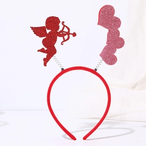 Detail of red Valentine's headband featuring glitter Cupid and pink heart on springs