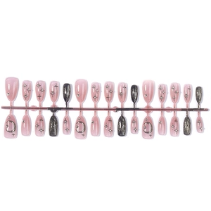 Pink cat eye press-on nails set with silver marble pattern and glitter star moon accents