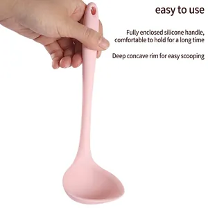 Handheld pink food-grade silicone soup ladle with deep bowl and non-stick handle