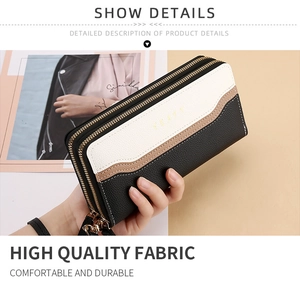 Detail of long double-zip women's wallet in tricolor faux leather with wrist strap