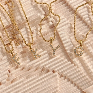 Gold twist rope chain necklace with sparkling cubic zirconia initial letter pendants