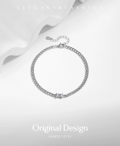 Detailed shot of an S925 sterling silver bracelet with emerald-cut clear gemstone