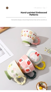 Detailed close-up of a hand-painted ceramic breakfast mug with textured relief patterns