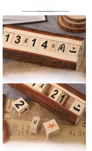Gros plan d'un calendrier en bois naturel avec base en écorce et détails gravés vintage