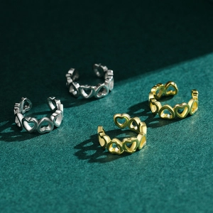 Minimalist S925 sterling silver hollow heart ear clips in silver and gold finishes